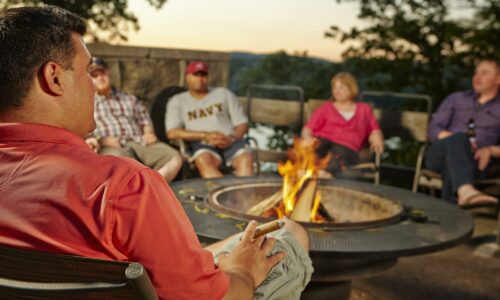 People sitting at a firepit