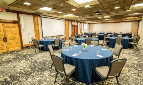 Conference room setup with round tables