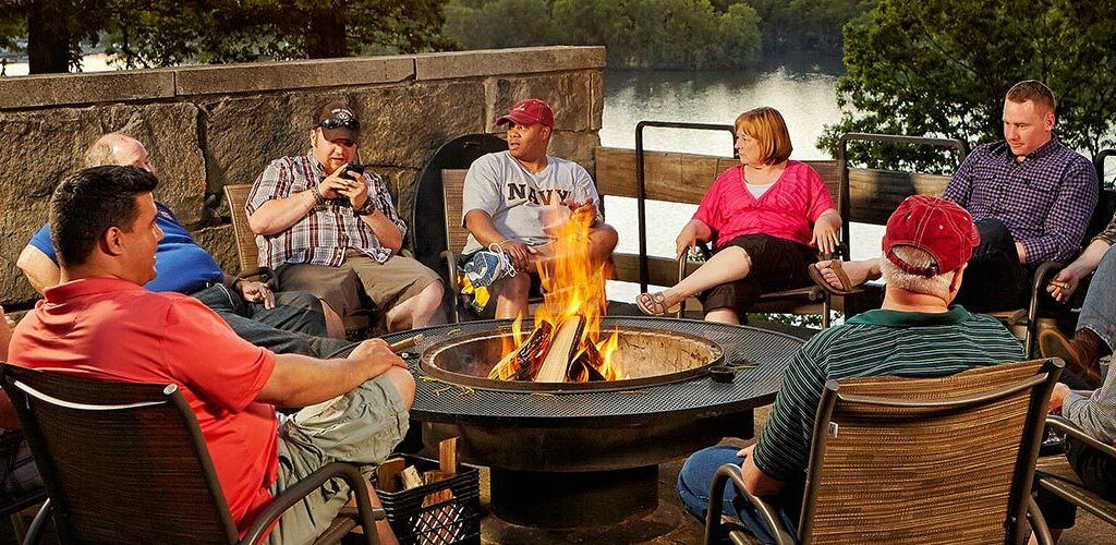 Family sitting around a firepit