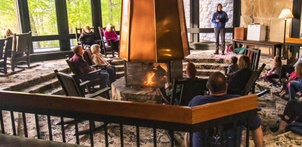 Lobby fireplace with people sitting around talking